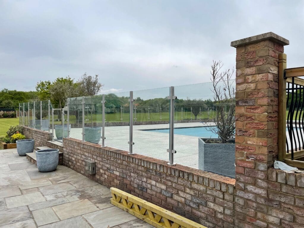 Stylish free floating glass balustrade, which not only looks great. It also gives you complete safety around your swimming pool