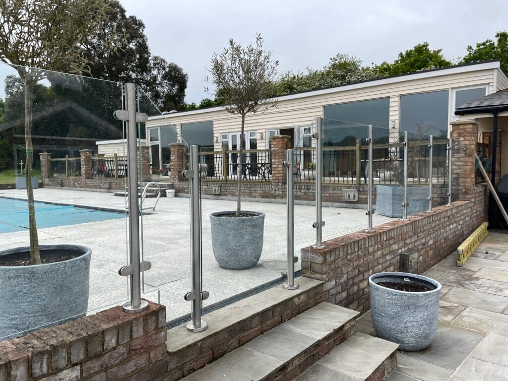 Stylish free floating glass balustrade, which not only looks great. It also gives you complete safety around your swimming pool