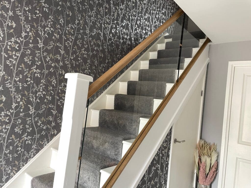 10mm clear toughened glass panel staircase with oak slotted handrail and base rail